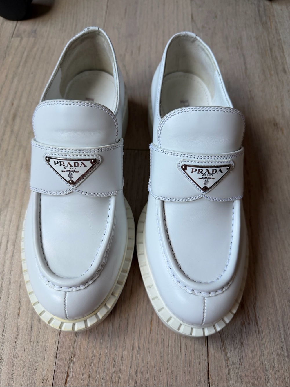 Authentic Prada Triangle White Leather Loafers